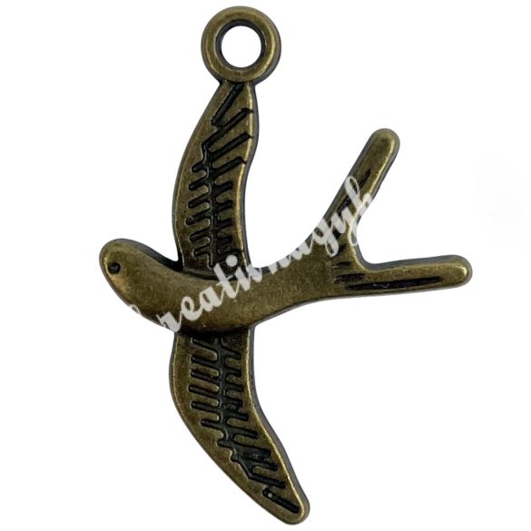 Fémmedál, madár, antikréz, 23x2x32 mm, 10 db/csomag
